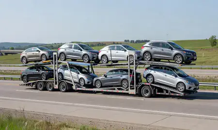 Multi-level car carrier on the highway to Wisconsin, United States