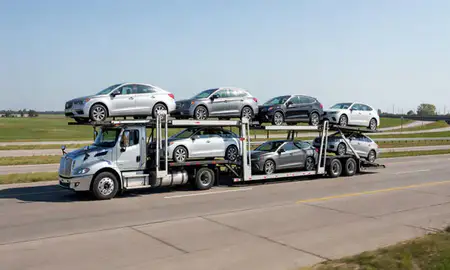 Multi-level car carrier on the highway to Appleton, Wisconsin, United States