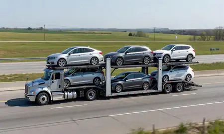 Multi-level car carrier on the highway to Fitchburg, Wisconsin, United States