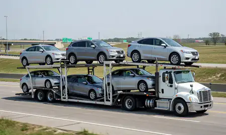 Multi-level car carrier on the highway to Fond du Lac, Wisconsin, United States