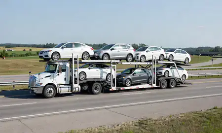 Multi-level car carrier on the highway to La Crosse, Wisconsin, United States