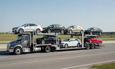 Multi-level car carrier on the highway to Neenah, Wisconsin, United States