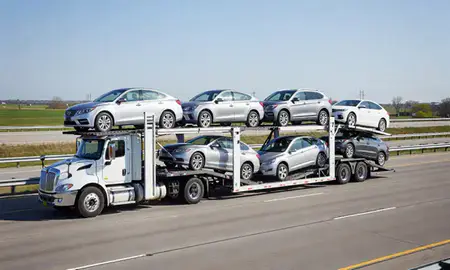 Multi-level car carrier on the highway to Oak Creek, Wisconsin, United States