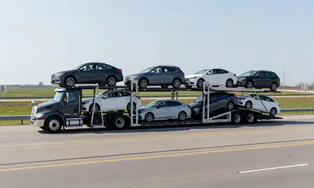 Multi-level car carrier on the highway to Racine, Wisconsin, United States