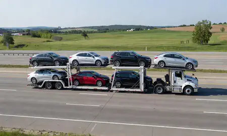 Multi-level car carrier on the highway to Sheboygan, Wisconsin, United States
