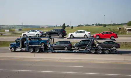 Multi-level car carrier on the highway to Wausau, Wisconsin, United States