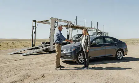 Vehicle owner beside their delivered car in Bar Nunn, Wyoming, United States