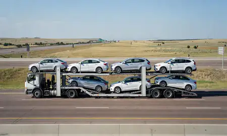 Multi-level car carrier on the highway to Cheyenne, Wyoming, United States