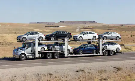 Multi-level car carrier on the highway to Gillette, Wyoming, United States
