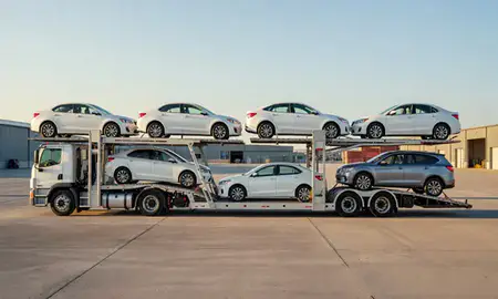 Car transporter parked in an industrial area of Gillette, Wyoming, United States