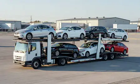Car transporter loaded with vehicles in Green River, Wyoming, United States