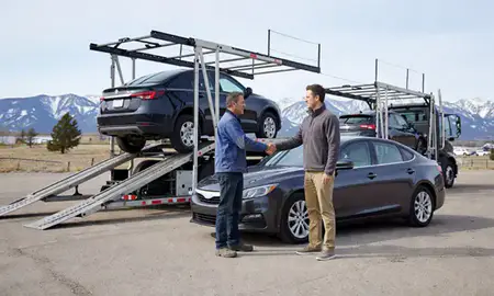 Vehicle owner beside their delivered car in Jackson, Wyoming, United States
