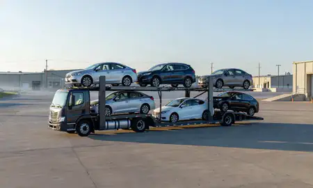 Car transporter loaded with vehicles in Jackson, Wyoming, United States