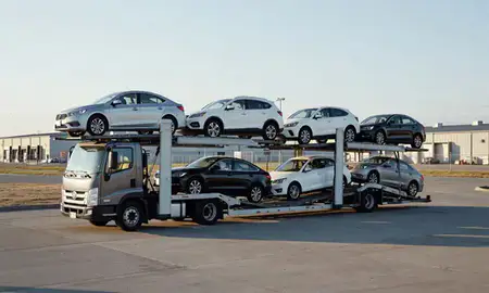 Car transporter loaded with vehicles in Mills, Wyoming, United States