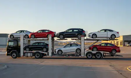 Car transporter parked in an industrial area of Powell, Wyoming, United States