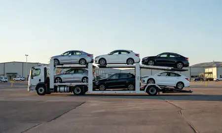 Car transporter loaded with vehicles in Thermopolis, Wyoming, United States